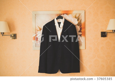 Stylish groom suit in dressing room indoors Stylish groom suit in dressing room indoors 37605385