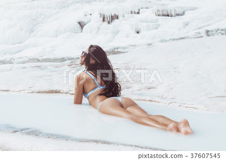 Tourist woman model in swimsuit in Pamukkale 37607545