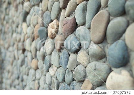 Sea pebble sea stones background natural polished 37607572