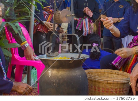 Women are making yarn from silk Women are making yarn from silk 37608759