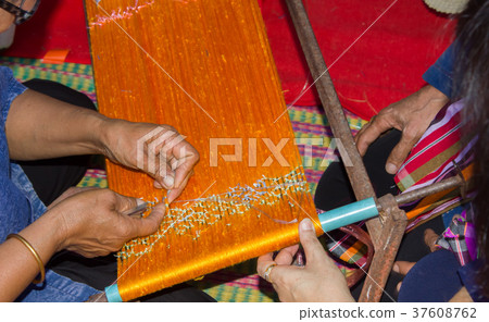 Women demonstration silk weaving Women demonstration silk weaving 37608762