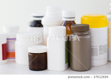 jars of different medicines 37612694