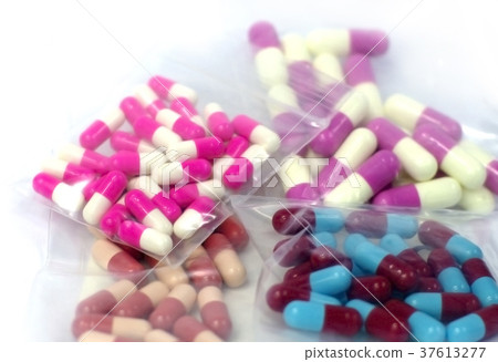 colourful medicine capsules in plastic package 37613277