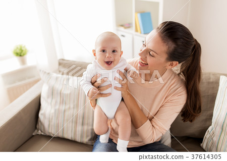 happy mother with little baby boy at home happy mother with little baby boy at home 37614305