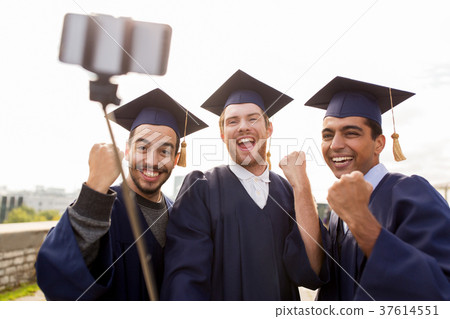 happy male students or graduates taking selfie happy male students or graduates taking selfie 37614551