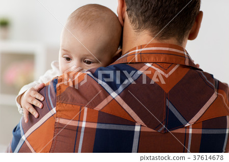 close up of happy little baby boy with father 37614678