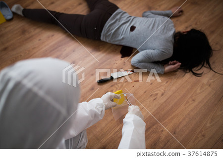criminalist collecting crime scene evidence 37614875