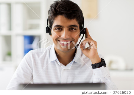 businessman with headset and computer at office 37616030