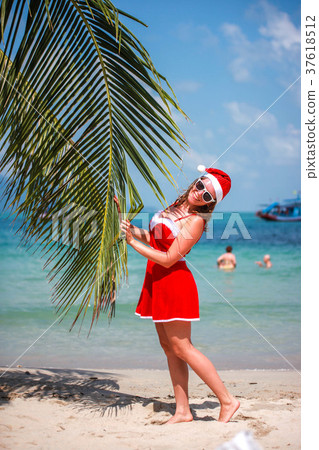 Cute blonde woman in red dress, sunglasses and 37618512