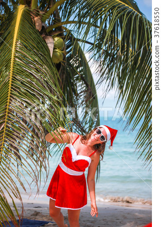 Cute blonde woman in red dress, sunglasses and 37618550