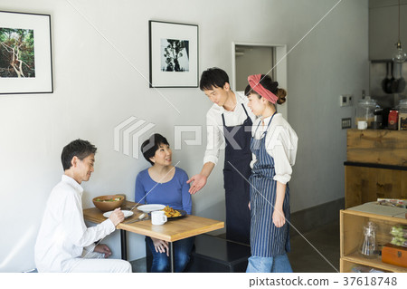 Staff and customers working in cafe Food business Staff and customers working in cafe Food business 37618748