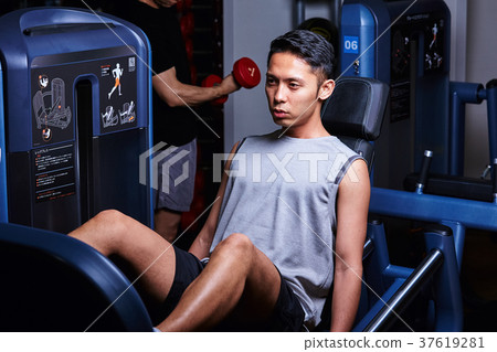 Men exercising in the gym Men exercising in the gym 37619281