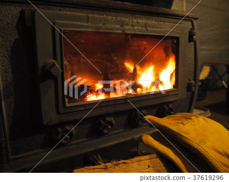 Wood Stove And Leather Gloves Stock Photo 37619296 Pixta