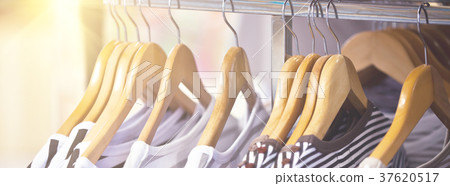 Striped Female Pullovers in a Clothing Store Striped Female Pullovers in a Clothing Store 37620517