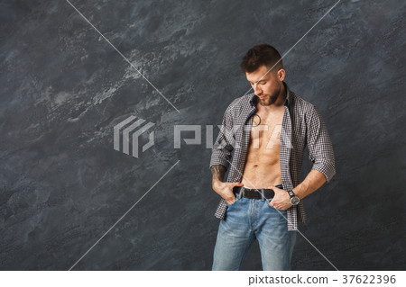 Handsome man with athletic body in studio 37622396