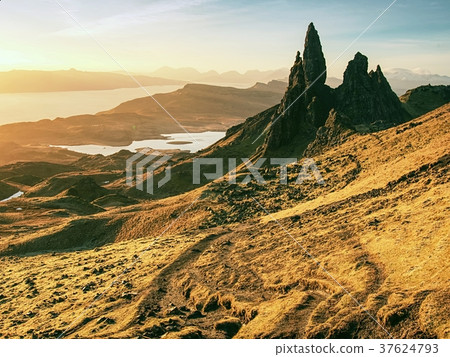 Famous exposed rocks Old Man of Storr, north hill 37624793