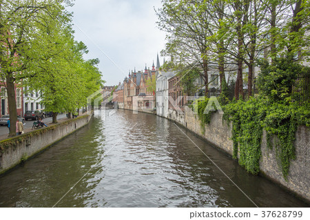Canal at the medieval city of Brugge Belgium. 37628799