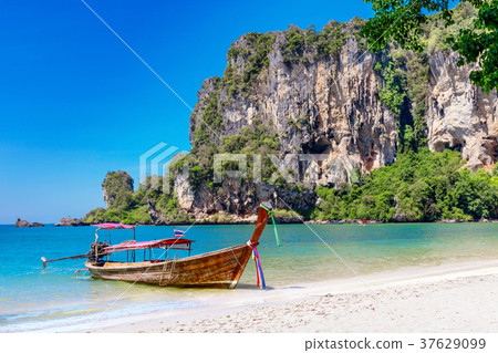 Traditional longtail boats, tropical sea Traditional longtail boats, tropical sea 37629099