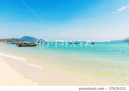 Andaman Sea with traditional longtail boats Rawai 37629152