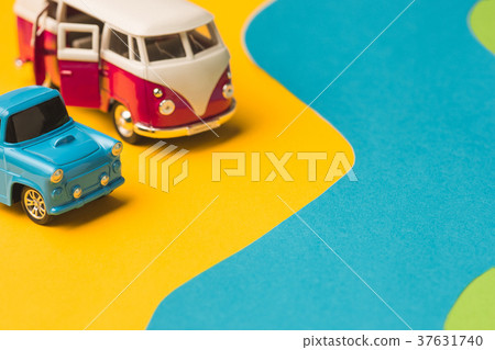 Vintage miniature car and bus in trendy color Vintage miniature car and bus in trendy color 37631740