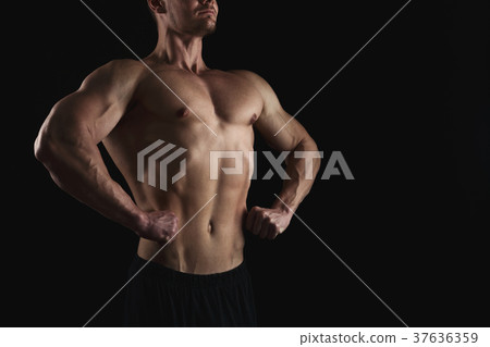 Strong athletic man showes naked muscular body 37636359