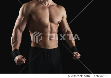Strong athletic man showes naked muscular body 37636360