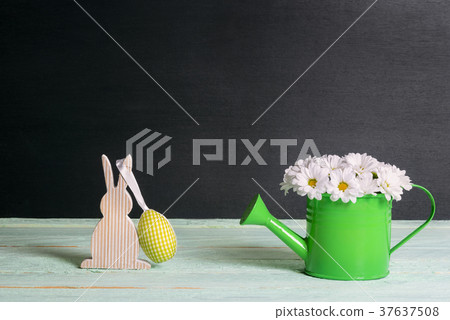 Daisies bouquet and a bunny with Easter egg Daisies bouquet and a bunny with Easter egg 37637508