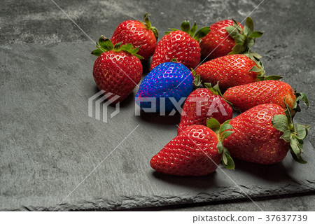 Blue strawberry business success concept. Blue strawberry business success concept. 37637739