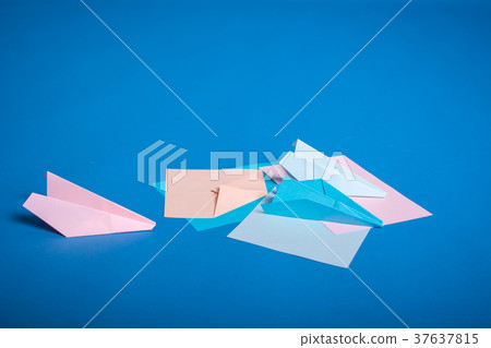 Place for making origami paper planes. Blue, blue, pink origami airplanes crafts Place for making origami paper planes. Blue, blue, pink origami airplanes crafts 37637815