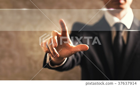 Businessman touching a screen 37637914