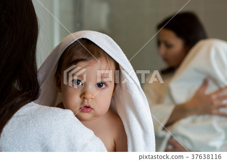 mother in a Bathrobe and with a child mother in a Bathrobe and with a child 37638116