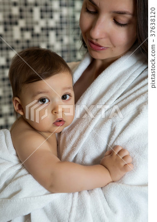 mother in a Bathrobe and with a child mother in a Bathrobe and with a child 37638120