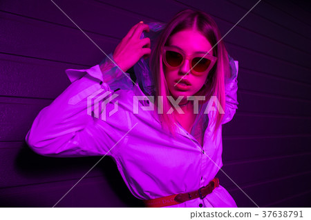 Art Fashion photo of a sexy model wearing glasses 37638791