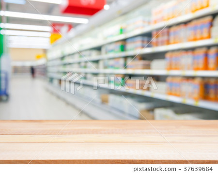 Empty table in front of blurred background Empty table in front of blurred background 37639684