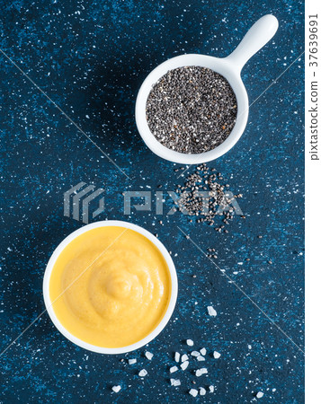 Vegan creamy cheddar cheese sauce with chia seeds 37639691