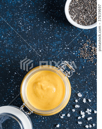Vegan creamy cheddar cheese sauce with chia seeds 37639697