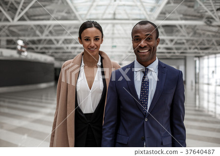 Joyful attractive business partners are expressing Joyful attractive business partners are expressing 37640487