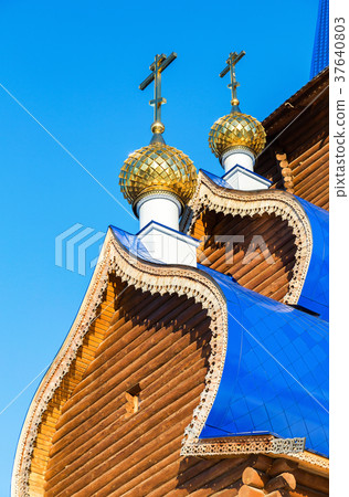 Golden domes with crosses on wooden 37640803