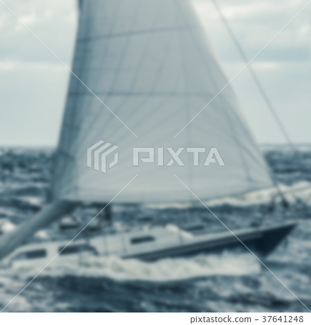 Blue sailboat - blurred image Blue sailboat - blurred image 37641248