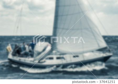 Blue sailboat - blurred image Blue sailboat - blurred image 37641251