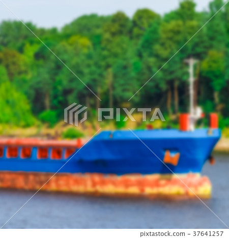 Blue cargo ship - blurred image Blue cargo ship - blurred image 37641257