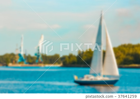 Blue sailboat - blurred image Blue sailboat - blurred image 37641259