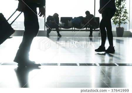 Airport image backlit silhouette slow motion 37641999