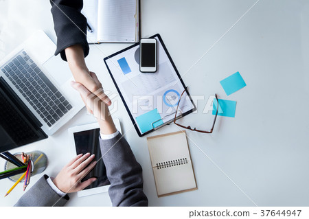 Business partnership handshake for deal business 37644947