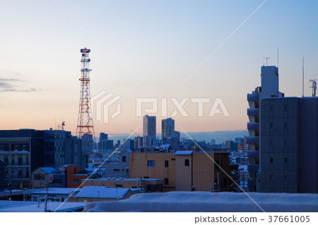 Snow scene and sunrise over downtown Snow scene and sunrise over downtown 37661005