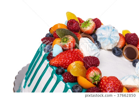 Delicious fruit cake with blue chocolate. 37662850