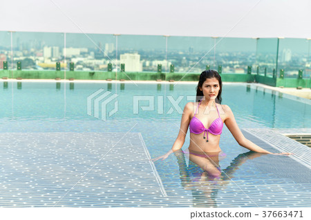 Swimsuit Concept. Beautiful girl wearing pink swimsuit. Beautifu 37663471