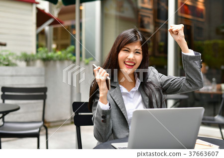 Business Concept.Young Asian businesswoman is working happily.Yo 37663607