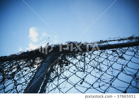 Fence shadow clouds 37665051