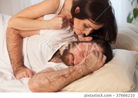 girl wakes up in the morning in bed man girl wakes up in the morning in bed man 37666210